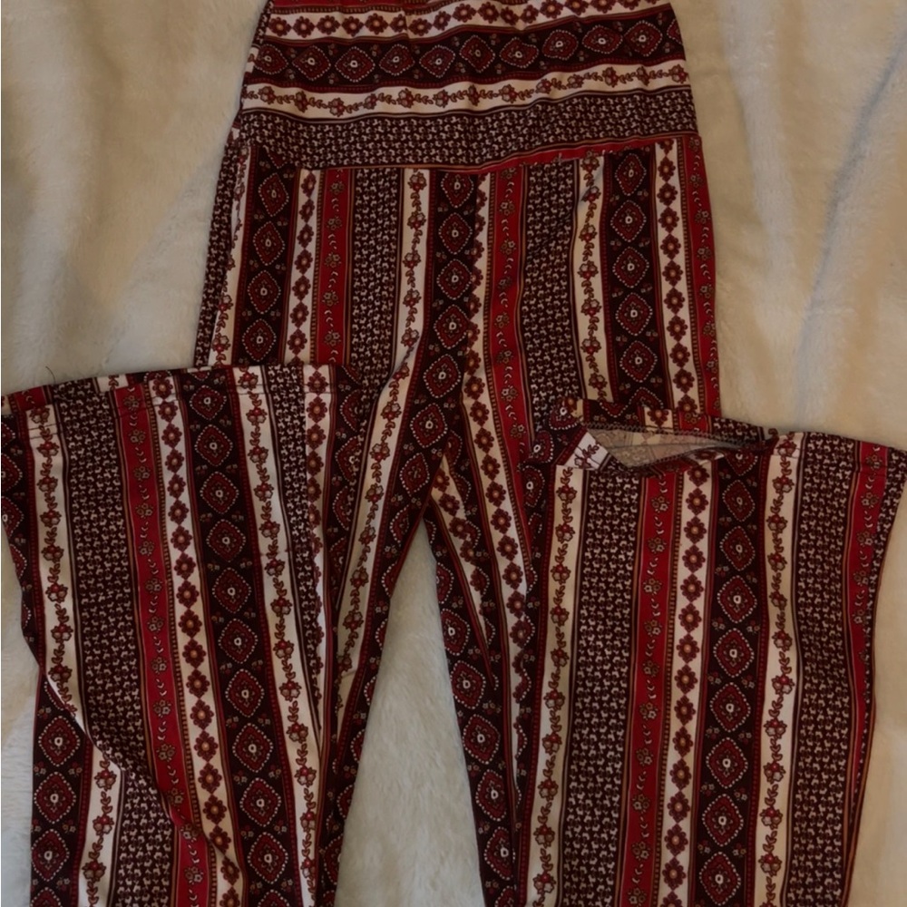 red and white patterned flared leggings